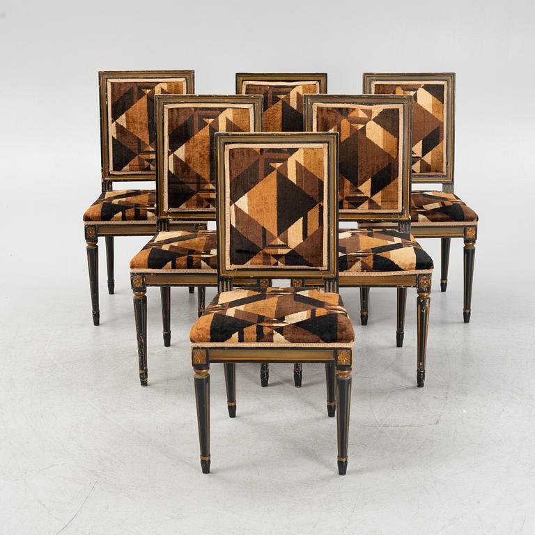 Dining table and 6 chairs, Louis XVI style. Early 20th century.