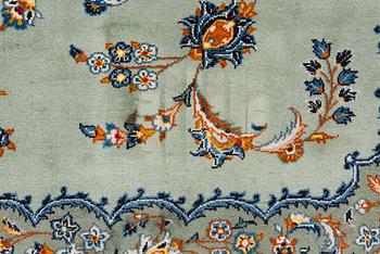 A Keshan carpet, signed, c. 376 x 270 cm.