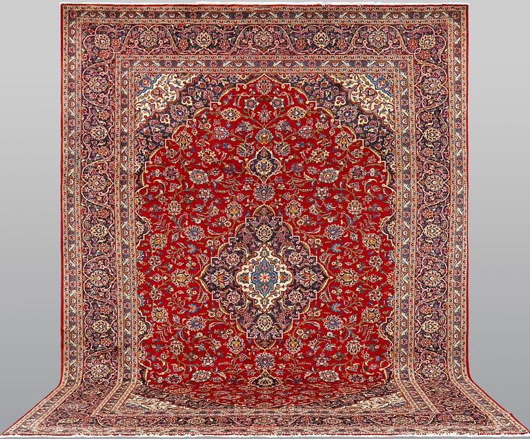 A Keshan carpet, 398 x 298 cm.