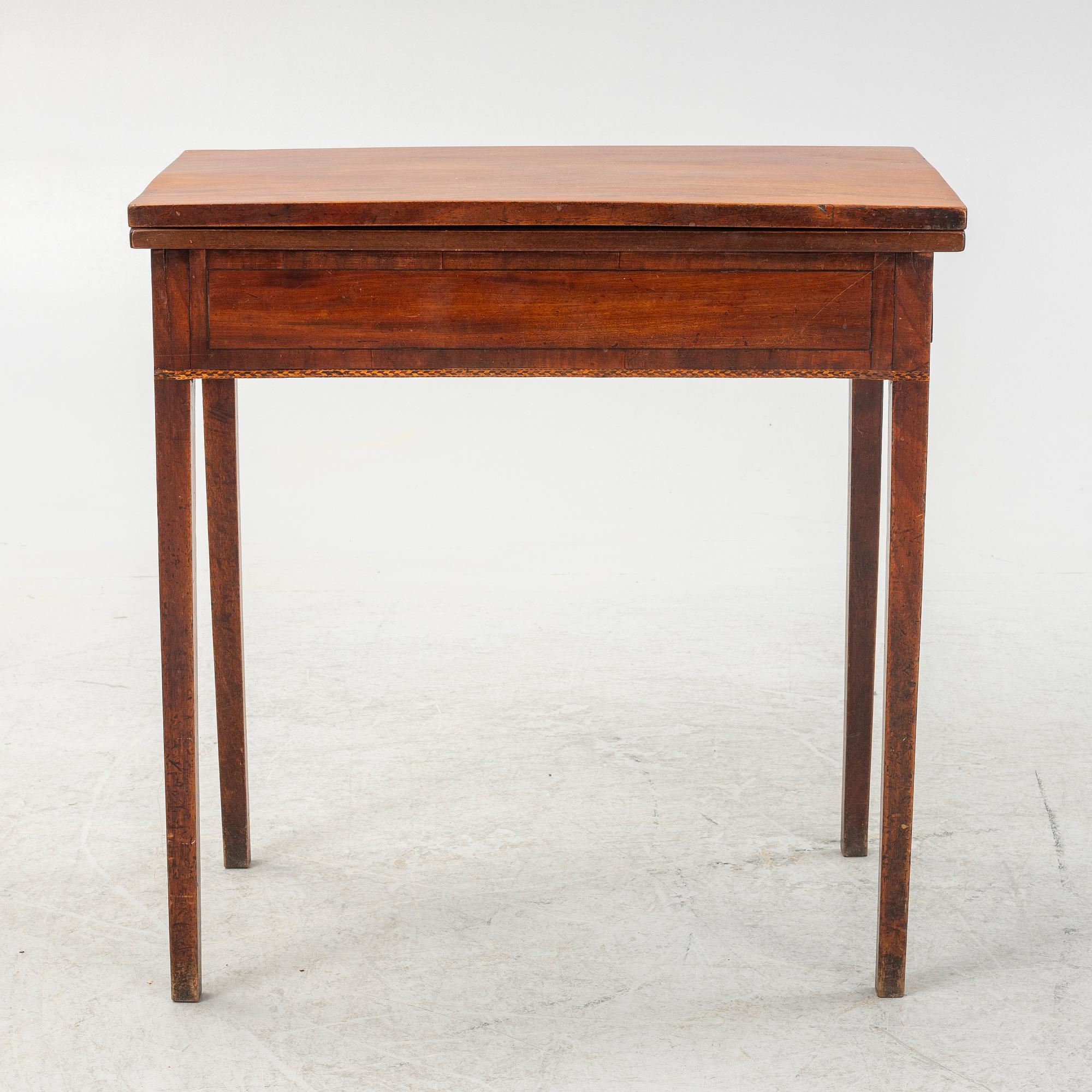 A late Gustavian mahogany card table, late 18th century.