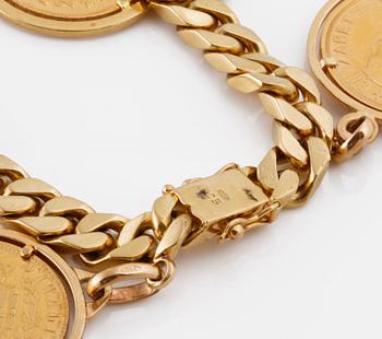 ARMLÄNK med 7 infattade mynt i 14K och 18K guld. Vikt 108,6 gram.