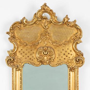 A Rococo style mirror, second half of the 19th Century.