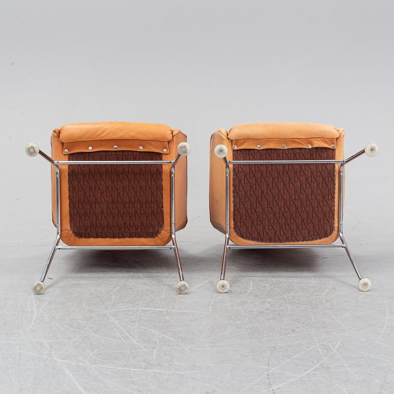 Six leather armchairs, 'Mirja', by Bruno Mathsson for Dux.