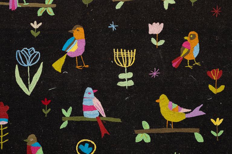 A hand-embroidered Kelim rug, 204 x 150 cm.