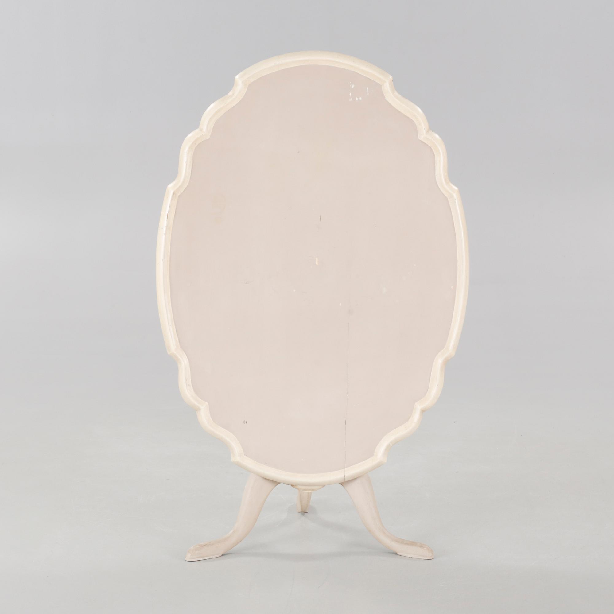 A late 19th century drop-leaf table.
