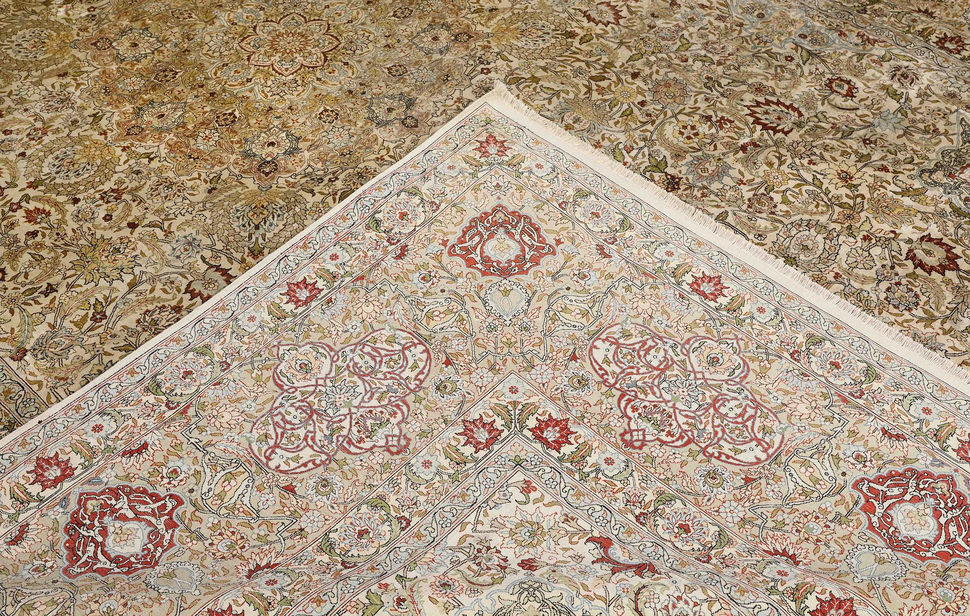 A oriental silk carpet, 350 x 247 cm.
