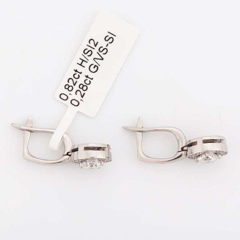 Brilliant-cut diamond earrings.