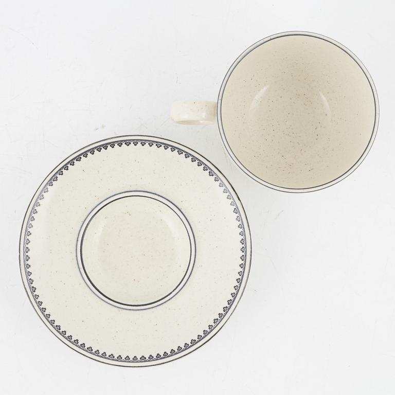 Stig Lindberg, a' Birka' cup with saucer, with royal monogram under crown, Gustavsberg, 1976.