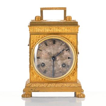 A late empire mantel clock, mid 19th century.