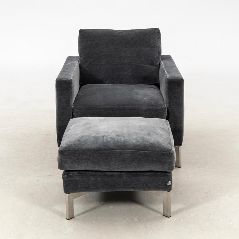Armchair with footstool Eilersen, 21st century.