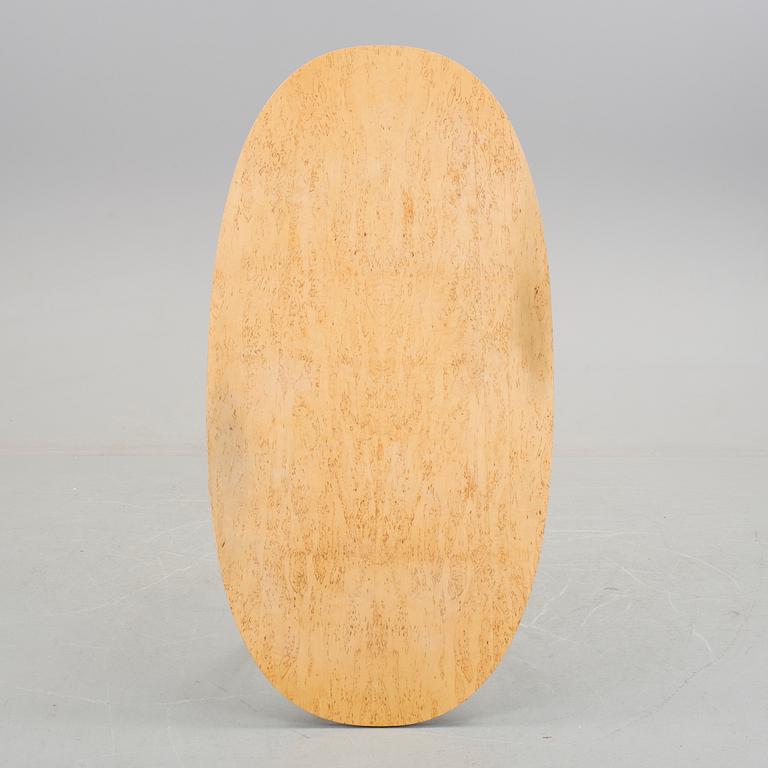 A table "Superellips" by Bruno Mathsson for Fritz Hansen.