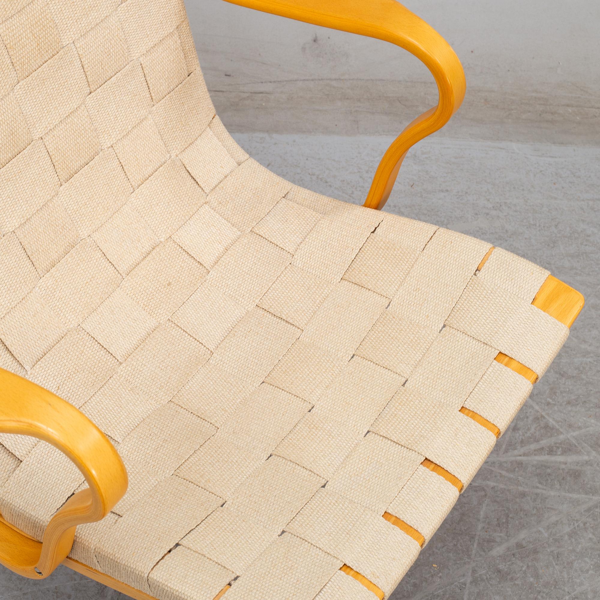 BRUNO MATHSSON, armchairs (2), "Eva hög", DUX, late 20th or early 21th C.