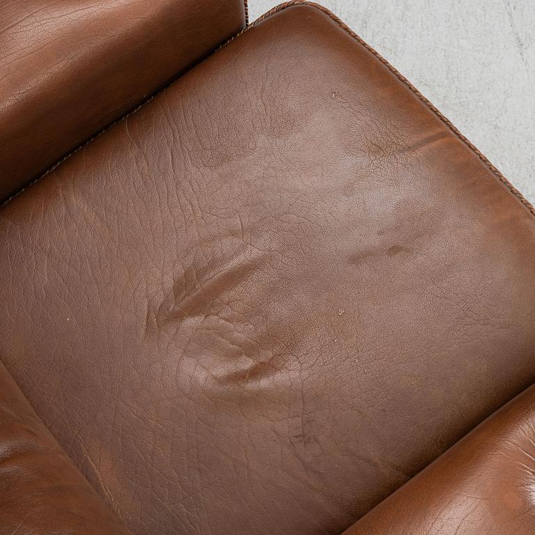 A Pair of Leather Armchairs, second half of the 20th Century.