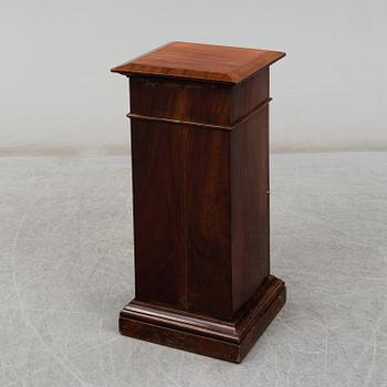 A Swedish Empire bedside table, early 19th century.