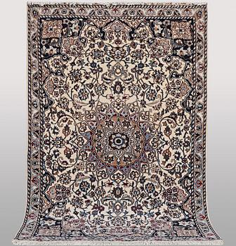 A rug, Nain, part silk, ca 196 x 120 cm.