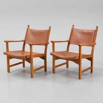 Carl Malmsten, & Yngve Ekström, a pair of easy chairs, model 'Caryngo', Swedese.