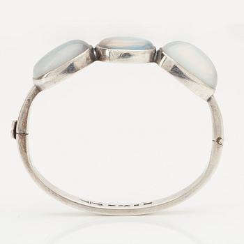 Wiwen Nilsson, a sterling and moonstones bangle with a pair of matching earrings, Lund Sweden 1937 ( bangle) and 1956.