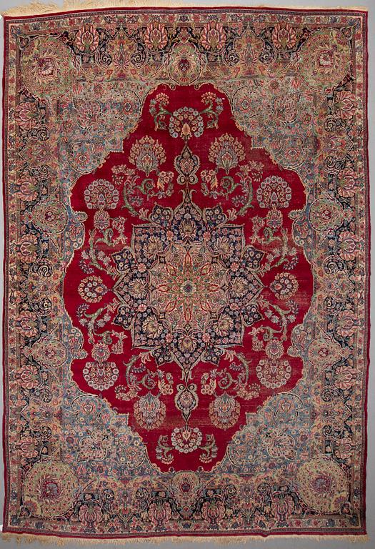 A CARPET, , semi-antique Kerman, ca 431 x 296 cm.