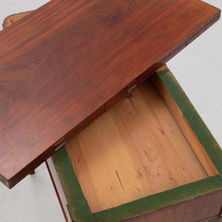 A mahogany games table, second half of the 19th Century.