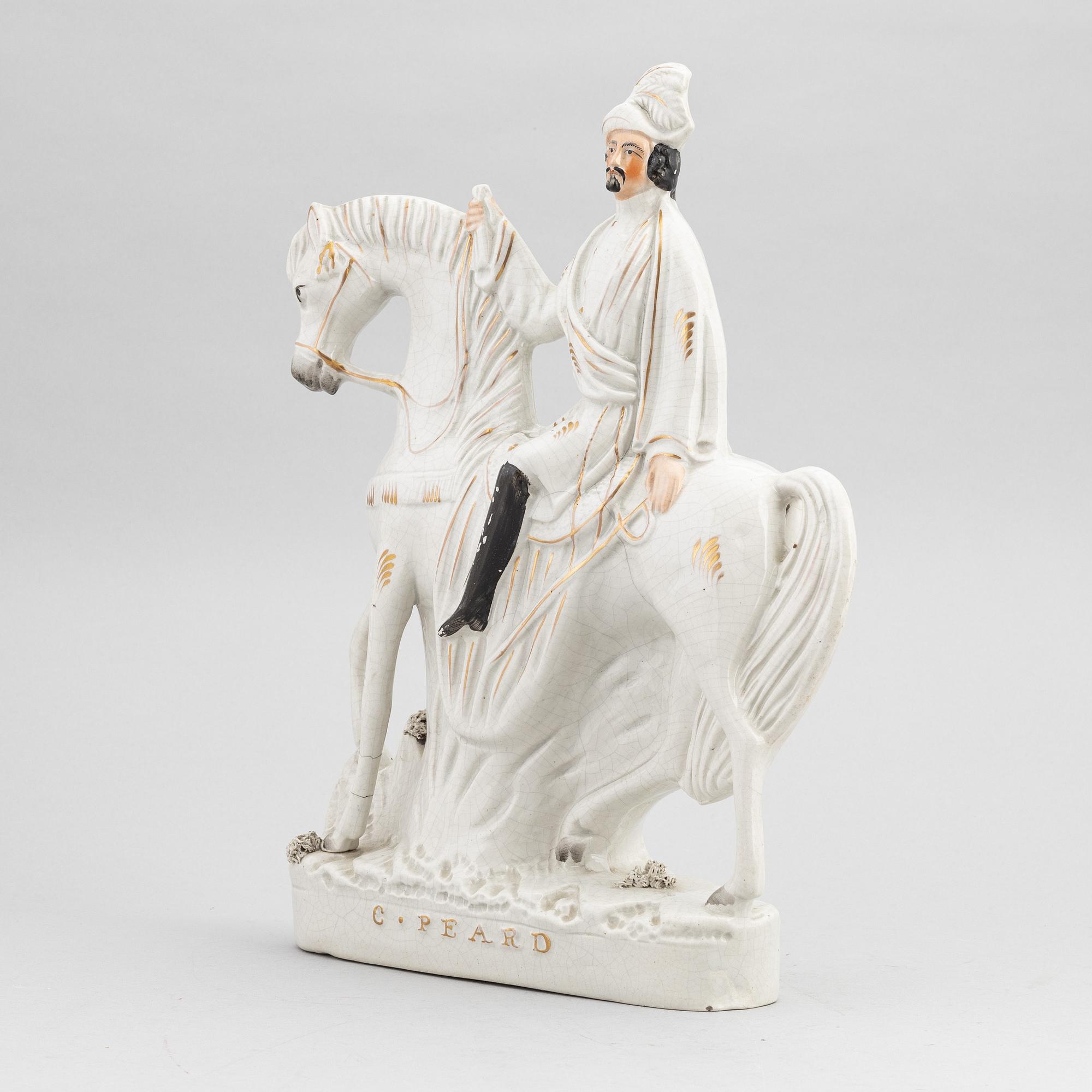 A set of eight English flintware figurines, 20th Century.