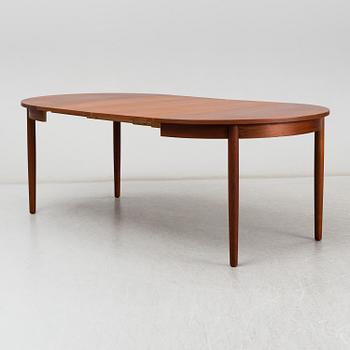 a teak dining table from the second half of the 20th century.