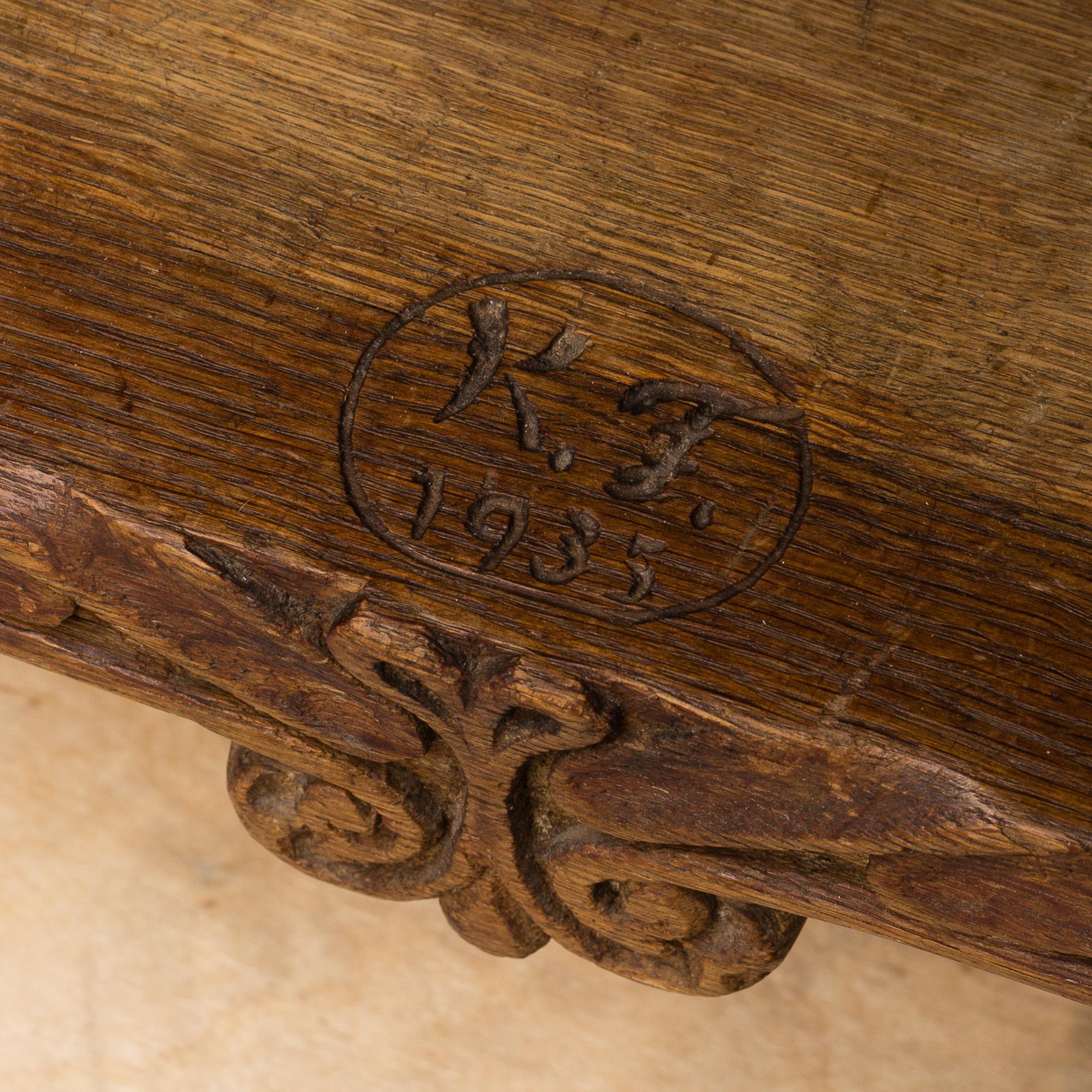 KNUT FJAESTAD, a folk art oak cabinet, signed KF 1935.