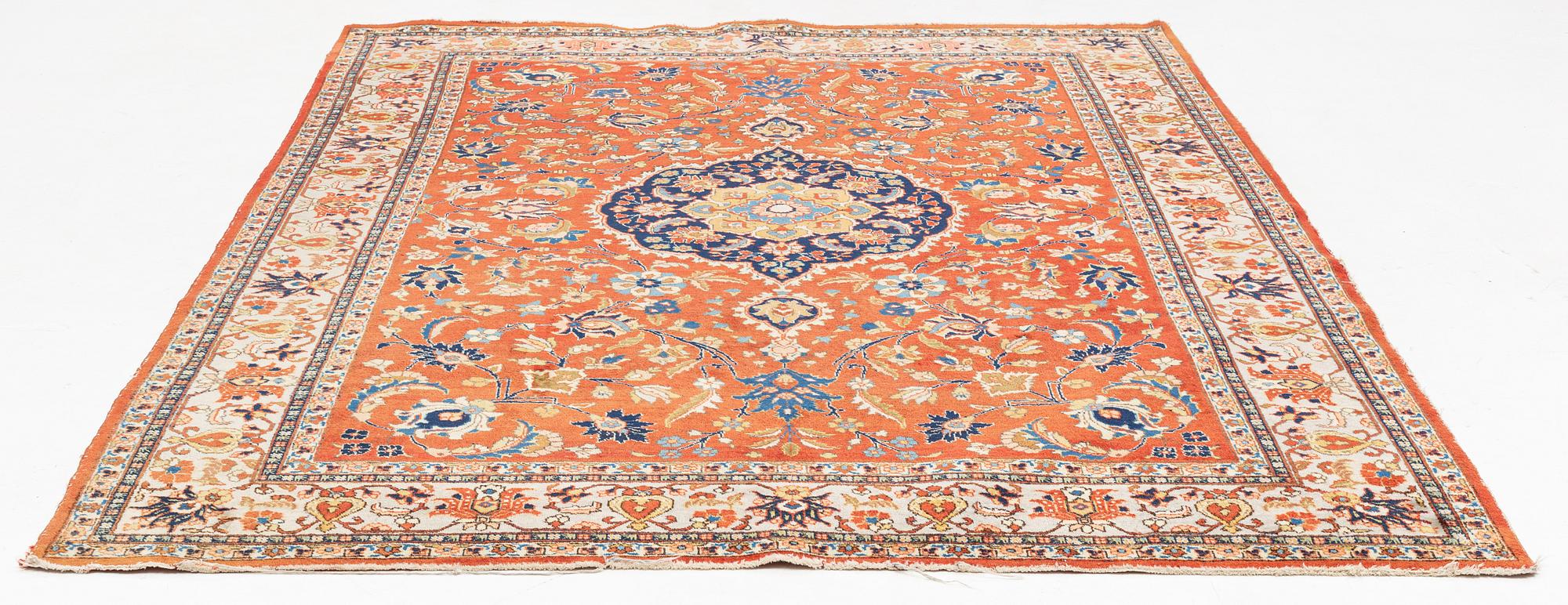 A oriental carpet, ca 320 x 223 cm.