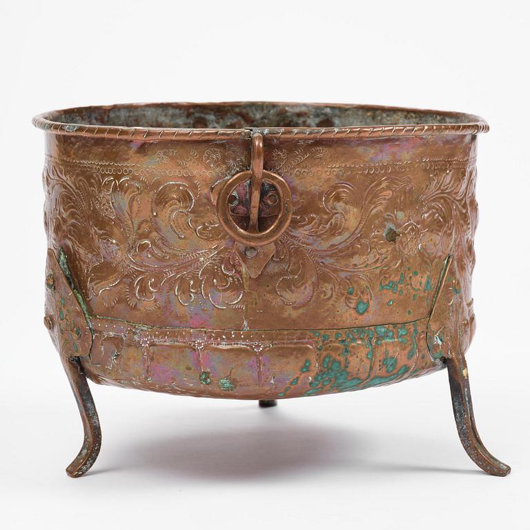 A Swedish baroque repousse copper cauldron, early 18th century.
