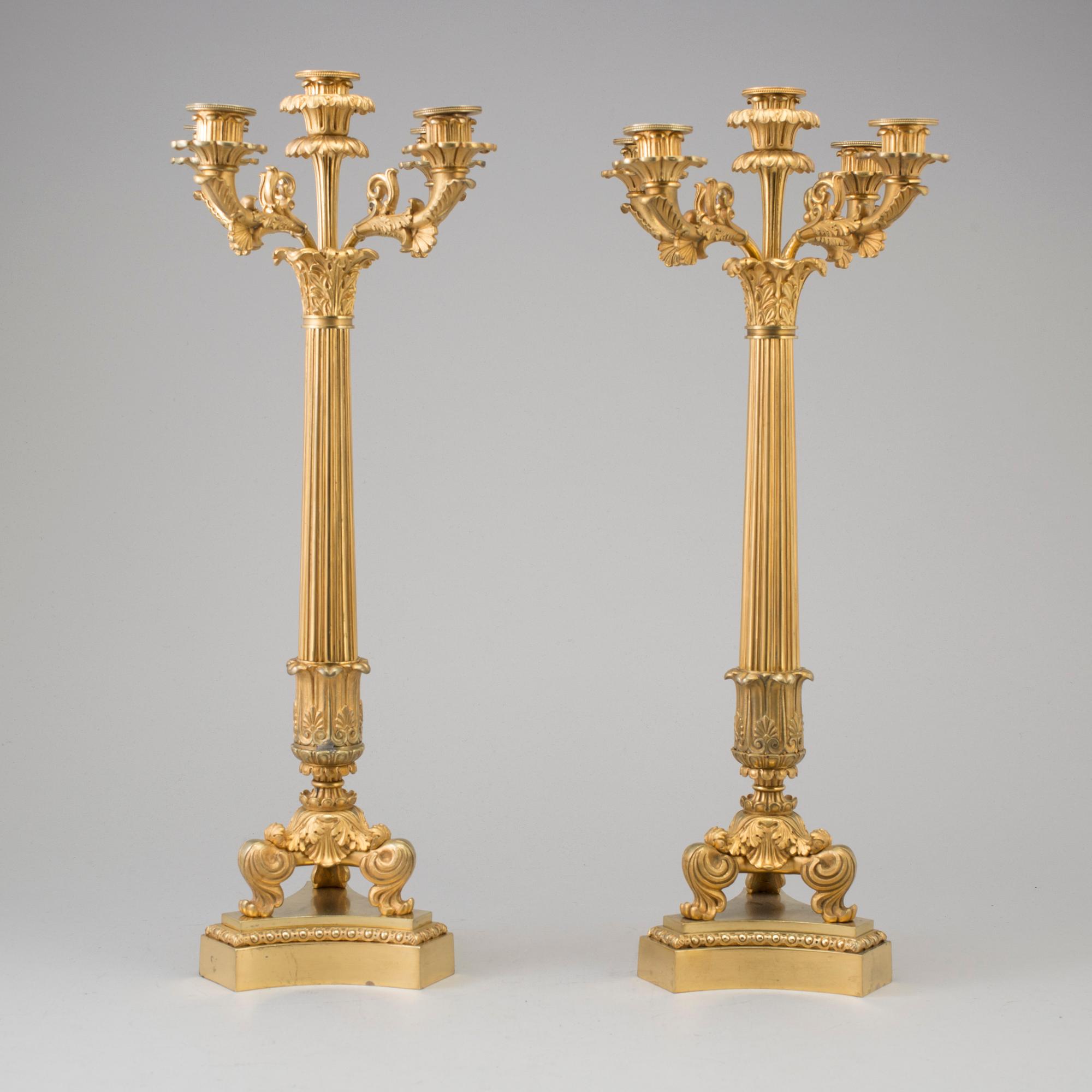 KANDELABRAR, ett par, förgylld brons, senempire, 1800-talets mitt.