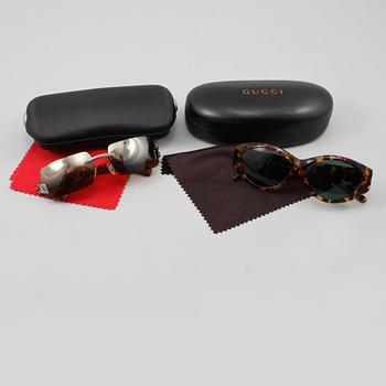 SOLGLASÖGON, 2 st, Gucci och Chanel.