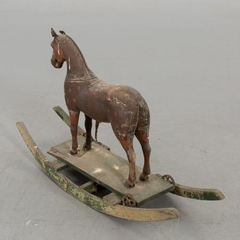 A ROCKING HORSE, 20th century.