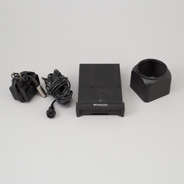 A black body Hasselblad 500 ELX Camera from Sweden 1986. With Sonnar 4/150 T*.