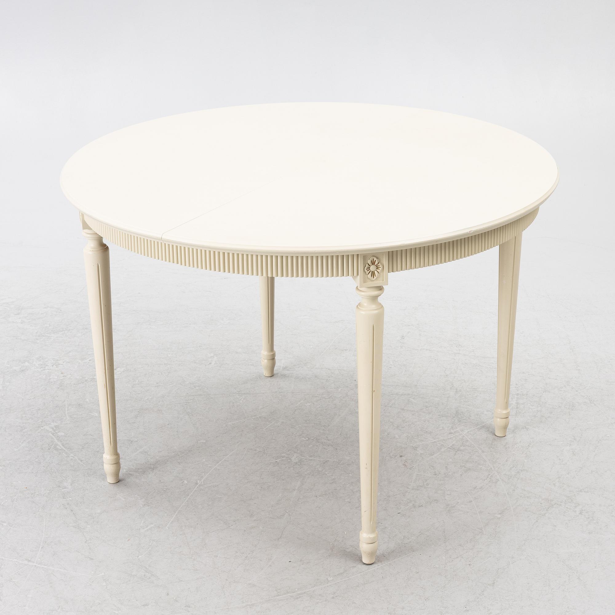 Dining table with 10 chairs, Gustavian style, second half of the 20th century.