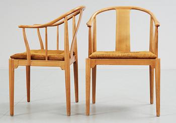 A pair of Hans J Wegner cherrywood 'China' armchairs, Fritz Hansen, Denmark 1966.