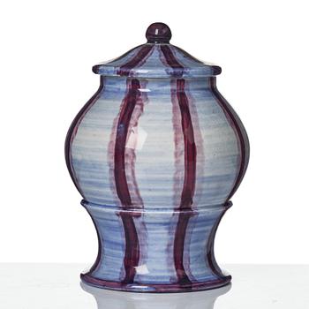 Wilhelm Kåge, a jar with cover, and four vases, creamware and porcelain, Gustavsberg, Sweden, 1917-1920.