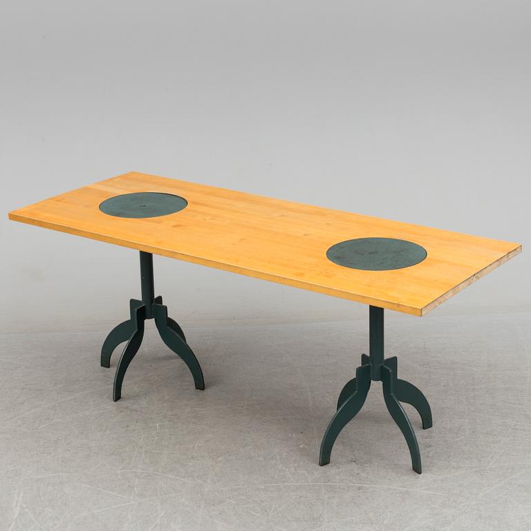 A "Triptyk" dining table by Jonas Bohlin for Källemo.