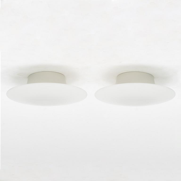 Arne Jacobsen, a pair of 'AJ-Eklipta' ceiling lamps / wall lamps, Louis Poulsen, Denmark.