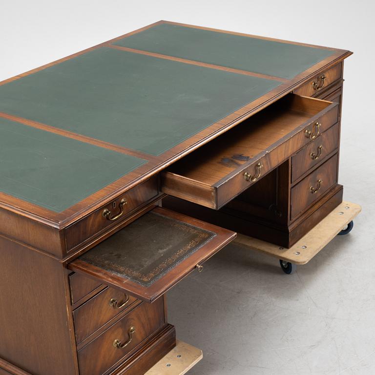 A 20th century Bevan Funnell Ltd Reprodux desk, England.