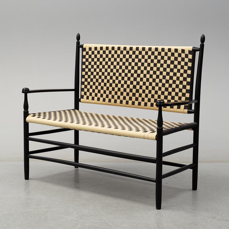 A Shaker style sofa and a pair of chairs, later part of the 20th century.