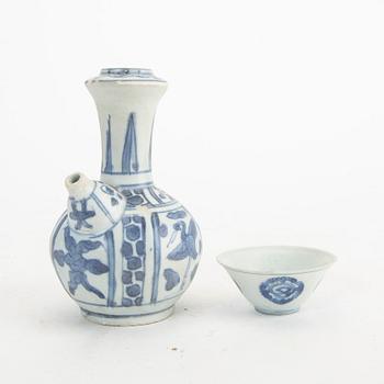 A blue and white kendi and cup, Ming Dynasty.