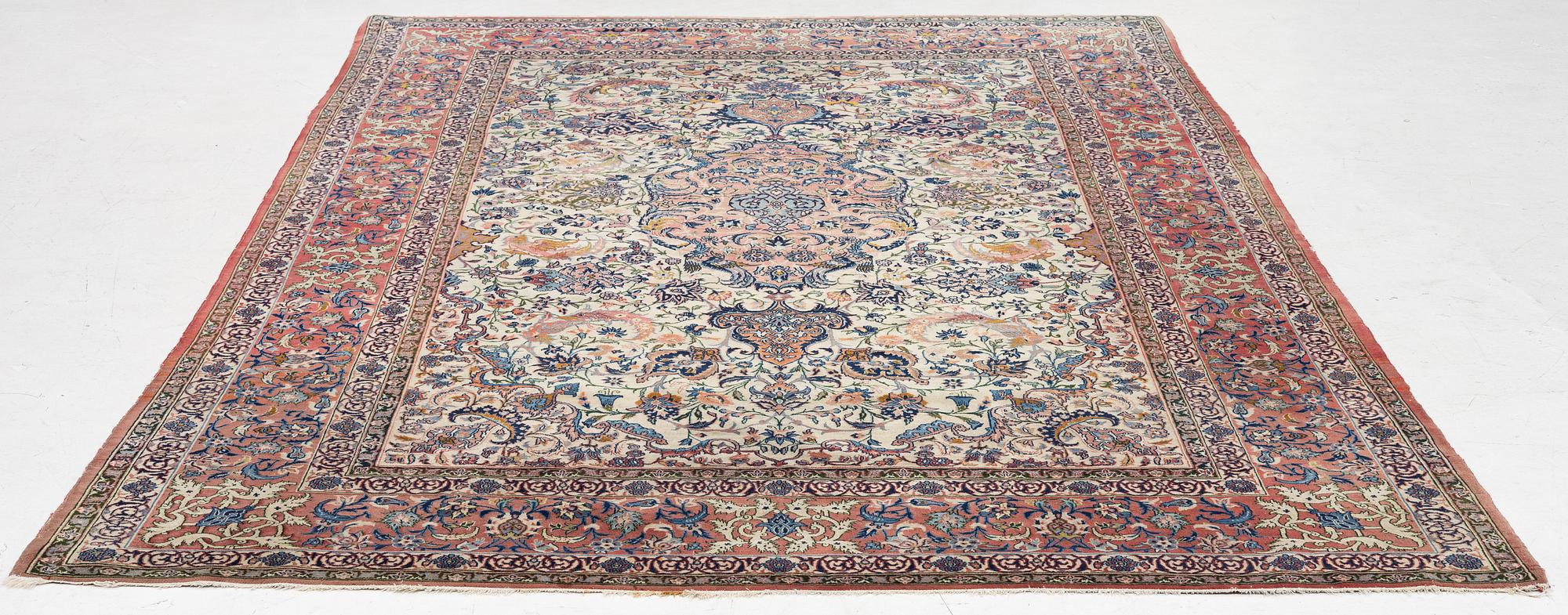 A semi-antique Isfahan carpet, central Iran, c. 325 x 210 cm.