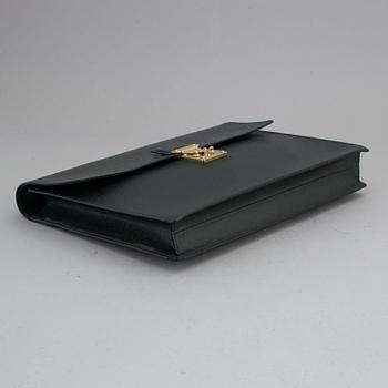 LOUIS VUITTON, a 'Taiga Serviette Kourad' briefcase.