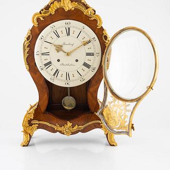 A rococo-style bracket clock, 20th century incorporating older elements.