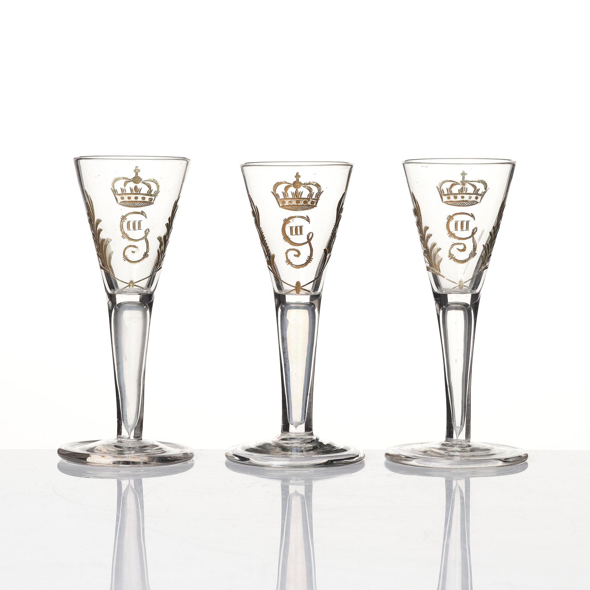 A set of six glasses and a bottle, Sweden, 18th century with King Gustavus IIIs monogram.