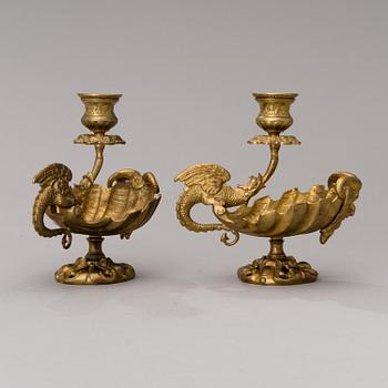 A pair of late 19th century gilt bronze candle holders.