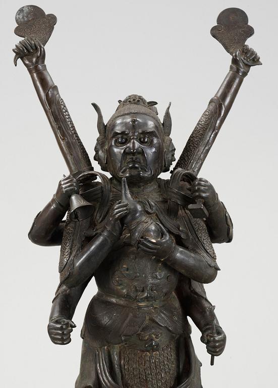 A massive Japanese bronze figure of a deity, 19th Century.