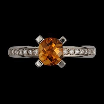 RING, 14k vitguld med citrin ca 0,84 ct samt briljantslipade diamanter tot ca 0,14 ct. Vikt ca 3,74 gram.
