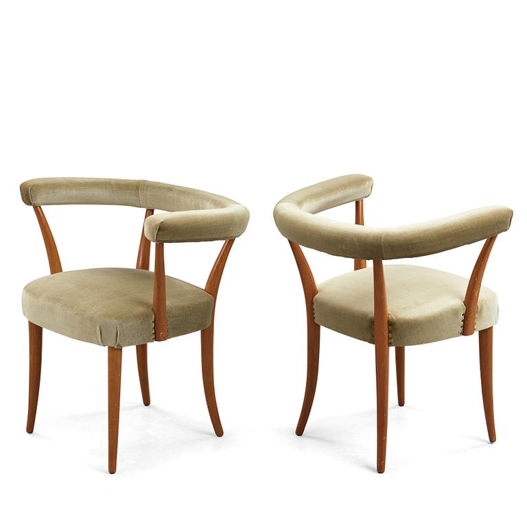 Josef Frank, a pair of mahogany horseshoe chairs, Svenskt Tenn, Sweden, mid 20th Century, model 966.