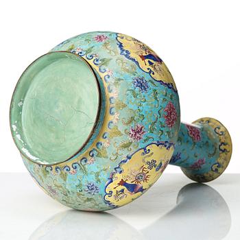 An enamel on copper vase, Qing dynasty, circa 1800.