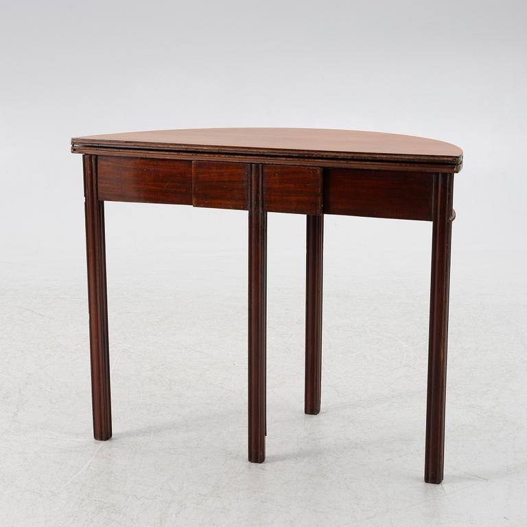 A late Gustavian mahogany games table by J. F. Wejssenburg (master in stockholm 1795-1837).